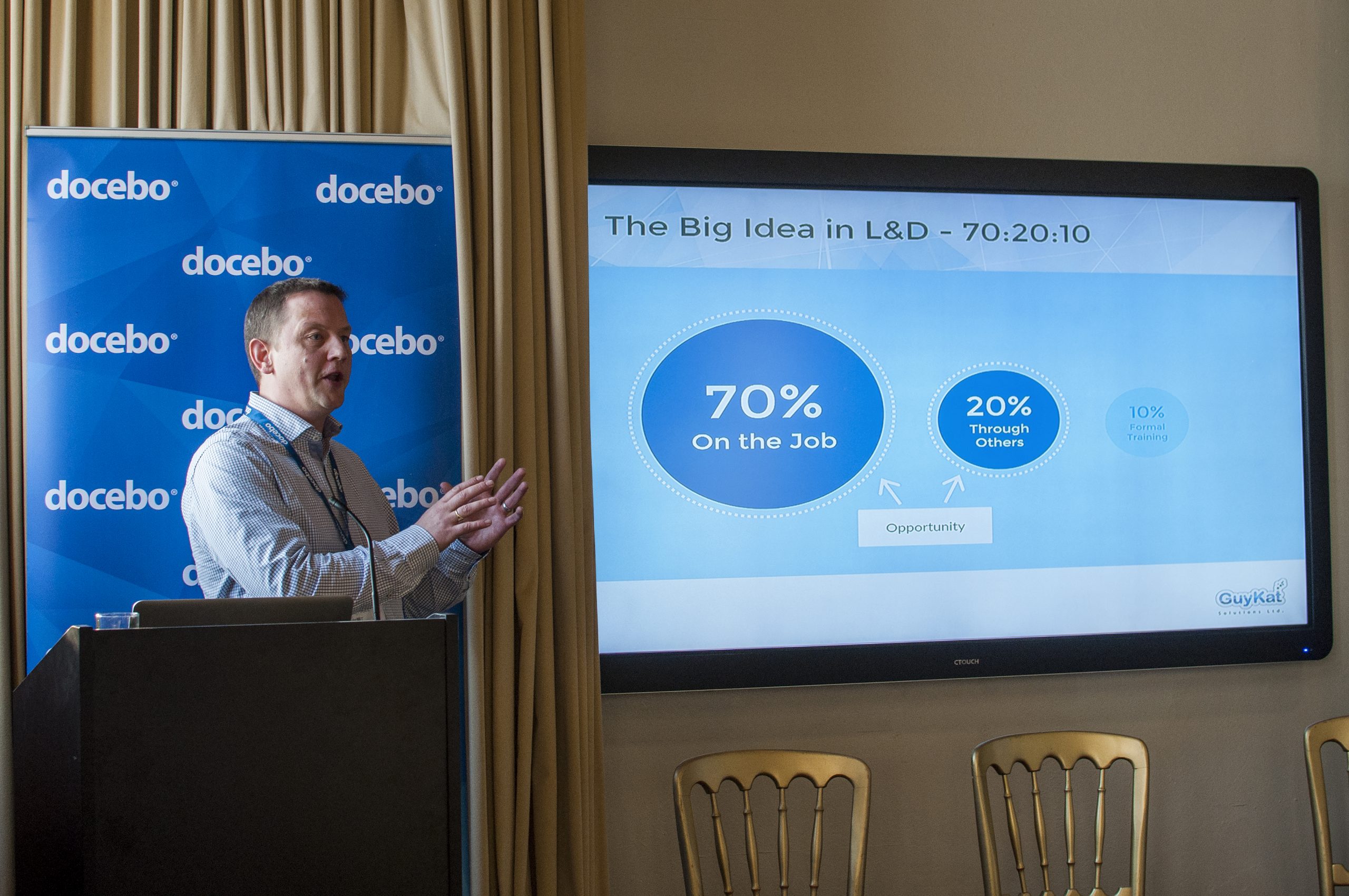 An image of Guykat founder Guy McEvoy presenting