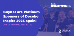 Five smiling members of the GuyKat team stand together at a conference booth. Text on the image announces that GuyKat are Platinum Sponsors of Docebo Inspire 2026 in Miami, taking place April 20–22.